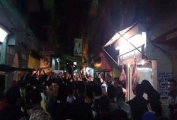 مسيرة المطرية تتوقف أمام منزل الشهيد أحمد بيومي