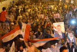 أهالي قرية "شارونة" بالمنيا يهتفون بالقصاص وإسقاط الانقلاب