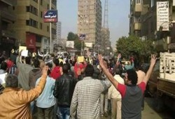 بالصور.. مظاهرة لشباب ضد الانقلاب بموقف بولاق