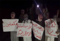 وقفة ليلية لثوار بئر العبد تدعو لانتفاضة 25 يناير