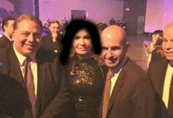 قنصل الانقلاب في كندا يلتقط الصور مع مغنية صهيونية