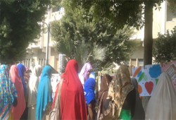 معرض مصور بجامعة الفيوم بعنوان "حلمنا لا يمكن يموت"