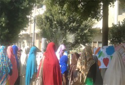 معرض مصور بجامعة الفيوم بعنوان "حلمنا لا يمكن يموت"