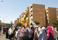 مسيرة لطالبات أزهر السادات تهتف بالقصاص للشهيد "إسلام فتحي"