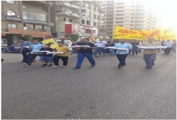 ثوار مدينة نصر يحملون أكفانهم في ذكرى مجزرة رابعة