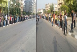 صور.. ثوار دمياط الجديدة يرفضون مهزلة الدم بسلسلة بشرية