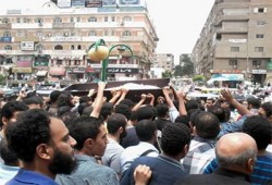 بالصور.. جنازة الشهيد إسلام غنيم تتحول إلى مسيرة حاشدة