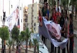 بالصور.. سلسلة بشرية لألتراس رابعاوي ببورسعيد