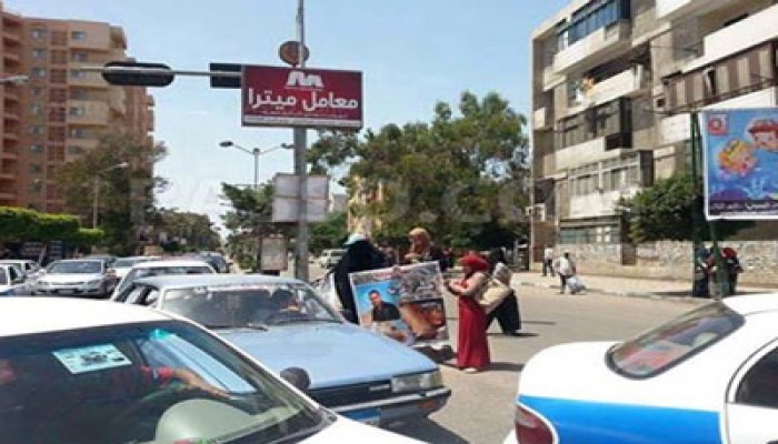 سيدة تتظاهر "منفردة" ببورسعيد ضد ظلم وقمع الانقلاب