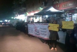 سلسلة بشرية لـ"نساء ضد الانقلاب" بحلوان تنديدًا بمجزرة الجمعة