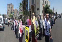 بالصور.. سلاسل لحرائر الإسكندرية للمطالبة بالإفراج عن المعتقلين