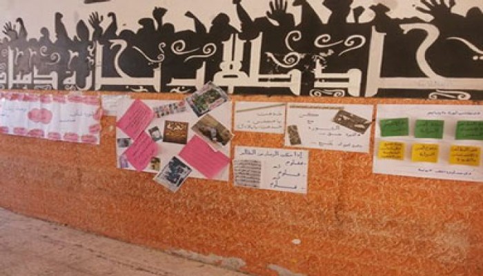 معرض طلابي بجامعة دمياط يفضح جرائم الانقلاب الفاشي