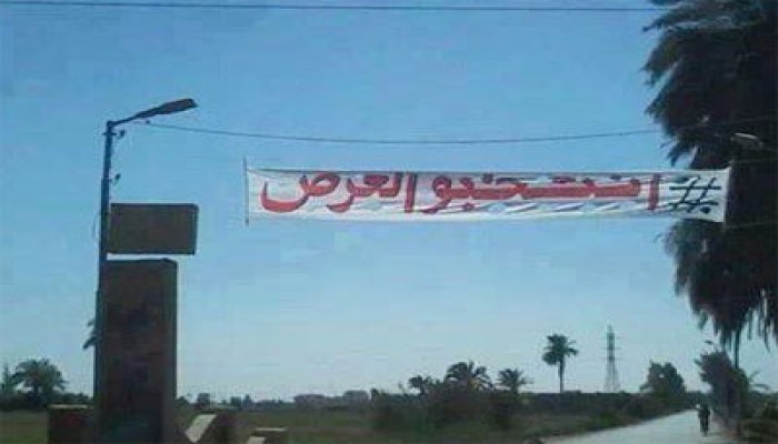 بالفيديو.. مطاردة وزير مالية الانقلاب في أمريكا بهاشتاج السفاح