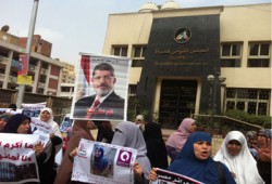 وقفة ومسيرة لـ"نساء ضد الانقلاب" بالهرم في يوم العالمي للمرأة