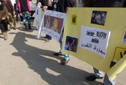 معرض مصور لمحرقة القرن ووقفة صامتة لطلاب حقوق السادات