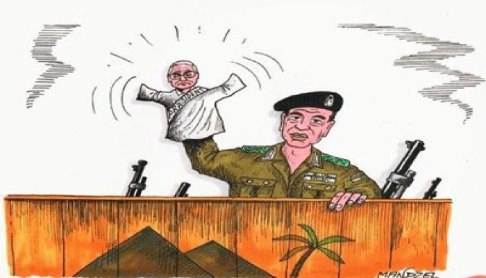 فنان ألماني يرسم "الطرطور" دمية في يد قائد الانقلاب