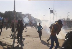 أمن الانقلاب بأسيوط يشعل النار في إحدى شرفات المنازل المجاورة للجامعة