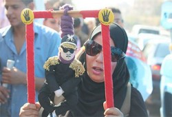 اﻷسوشيتد برس: غضب واسع بين مؤيدي ومعارضي الانقلابيين بسبب قانون التظاهر