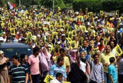 جلوبال بوست: قانون الانقلابيين للتظاهر قمعي ويعادي الديمقراطية