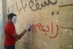 بالصور.. طلاب الأزهر يزينون الجدران بالشعارات الرافضة للانقلاب