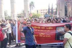 جرافيتي لمجازر العسكر بجامعة عين شمس واحتفال بطالبة محررة
