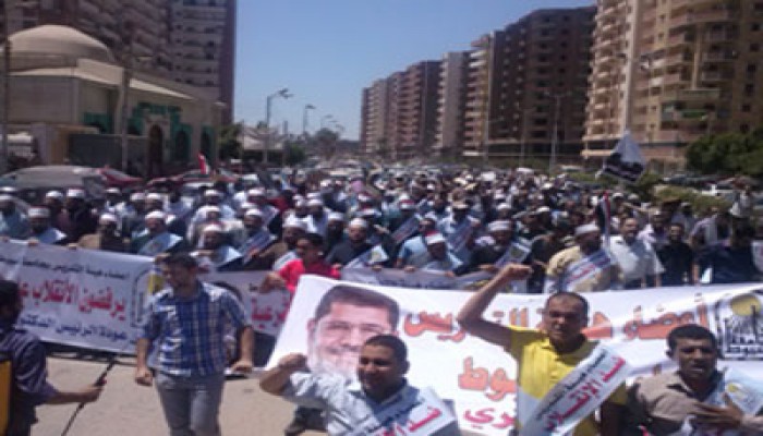 بالصور .. مسيرة لأساتذة جامعتي الأزهر وأسيوط لرفض الانقلاب