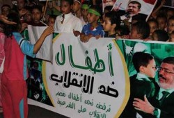 أطفال ضد الانقلاب" يلهبون منصة رابعة بالأناشيد