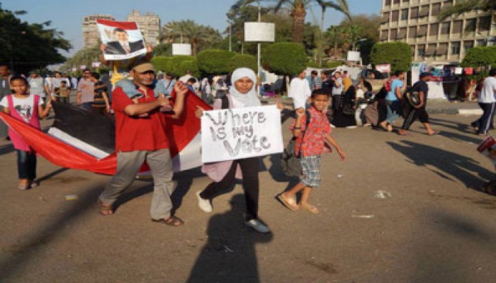 "تايم" تتوقع عودة الرئيس الشرعي وتؤكد: أنصار مرسي أعظم متظاهري العالم