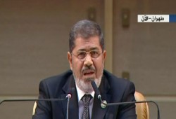 ناشط سوري: قوة مرسي دفعت وفد بشار للانسحاب