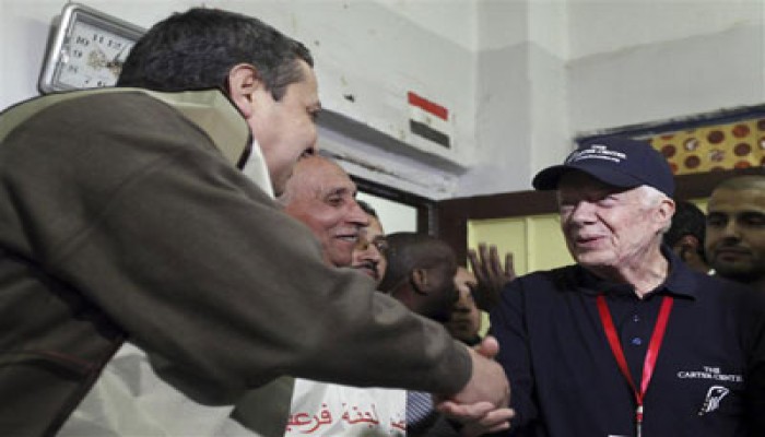 كارتر يشيد بطوابير الناخبين أمام مقرات الانتخاب