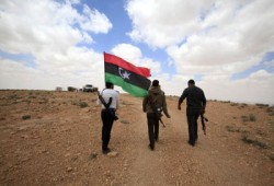 تمويل ثوار ليبيا من أموال القذافي المجمدة