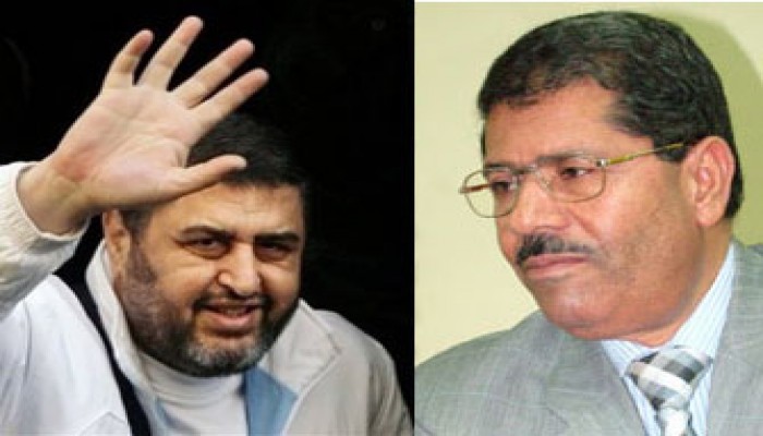 د. مرسي يهنئ المهندس الشاطر بمناسبة زفاف كريمته