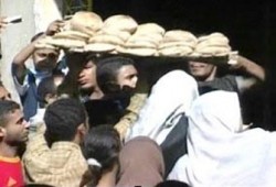 نواب الإخوان يناقشون أزمة رغيف العيش مع مصيلحي