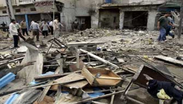 ثلثا مليون قتيل مدني بالعراق" عنوان مخيف بصحف العالم