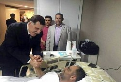 "ساويرس" يواصل هجومه على رئيس الحكومة الشرعية "السراج" بصورة "فوتوشوب"