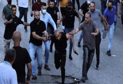 لجنة المتابعة الفلسطينية تندد بقمع أمن السلطة المسيرات برام الله