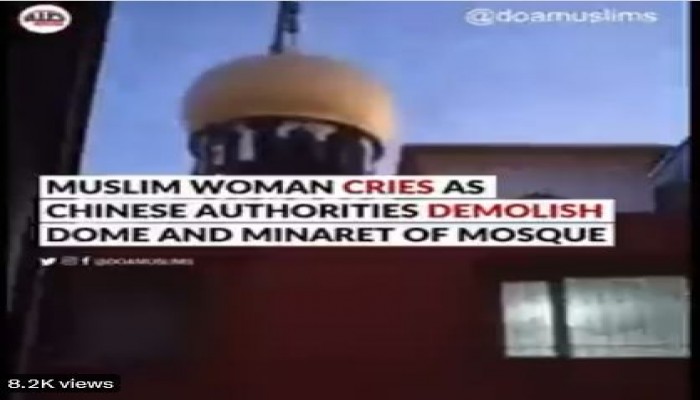 مسلمة صينية تبكي لفشل محاولاتها الفردية لمنع هدم مئذنة مسجد وقبابه