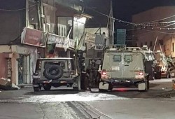 اشتباكات ضارية في جنين وحملات دهم واعتقالات بالضفة