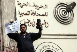 داخلية الانقلاب تعتقل فنان الكاريكاتير أشرف عمر